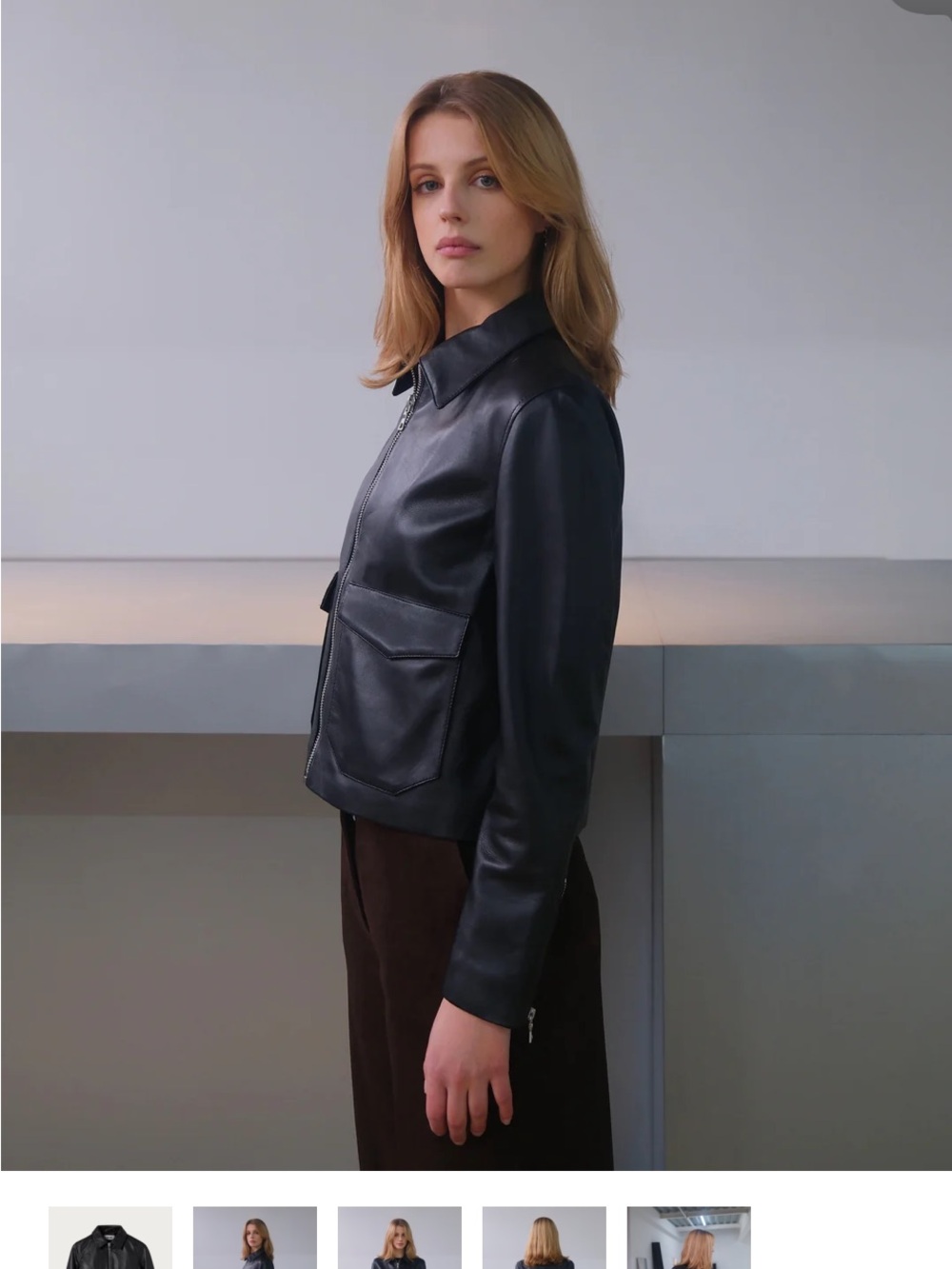 LEATHER CROPPED BLOUSON $814.00 MSRP 
By A.M Black Nappa Jacket